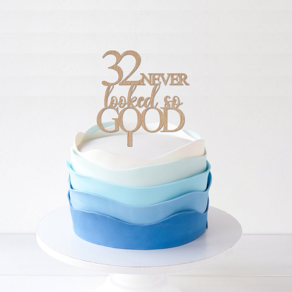 Wooden cake topper 32 never looked so good